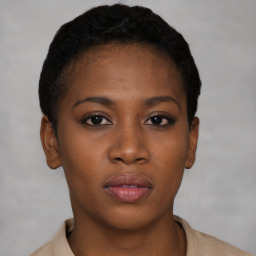 Neutral black young-adult female with short  brown hair and brown eyes