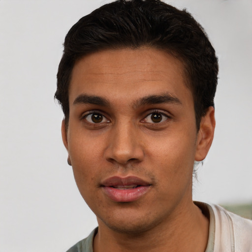 Neutral white young-adult male with short  black hair and brown eyes
