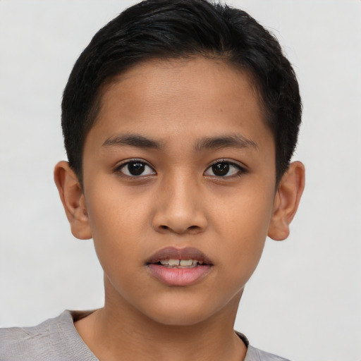 Joyful latino young-adult male with short  brown hair and brown eyes