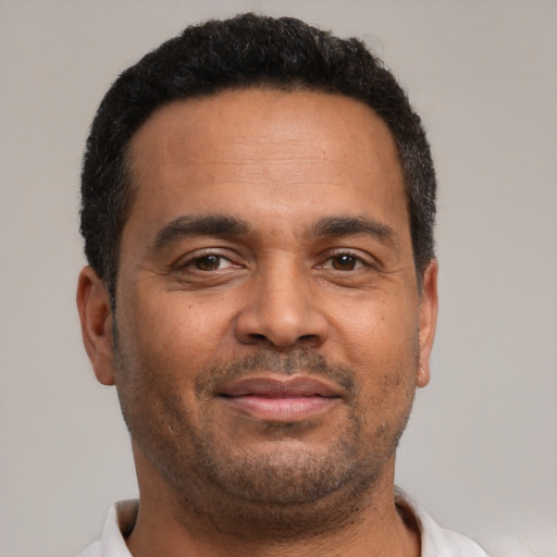 Neutral black adult male with short  brown hair and brown eyes