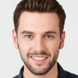 Joyful white young-adult male with short  brown hair and brown eyes