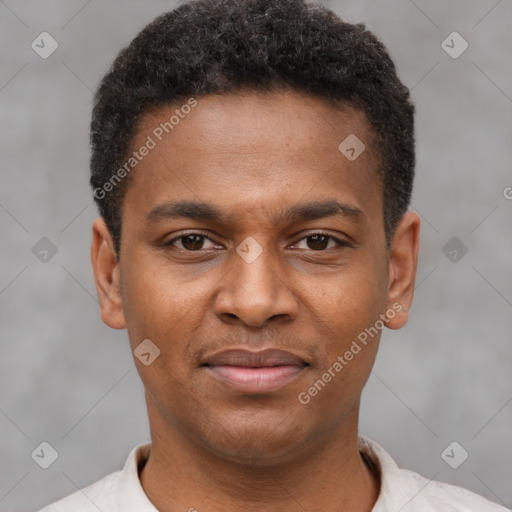 Joyful latino young-adult male with short  brown hair and brown eyes