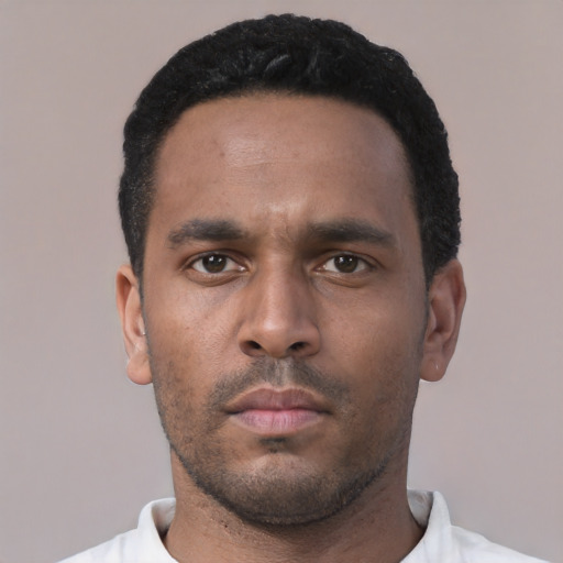 Neutral black young-adult male with short  black hair and brown eyes