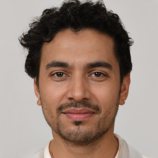 Neutral latino young-adult male with short  brown hair and brown eyes