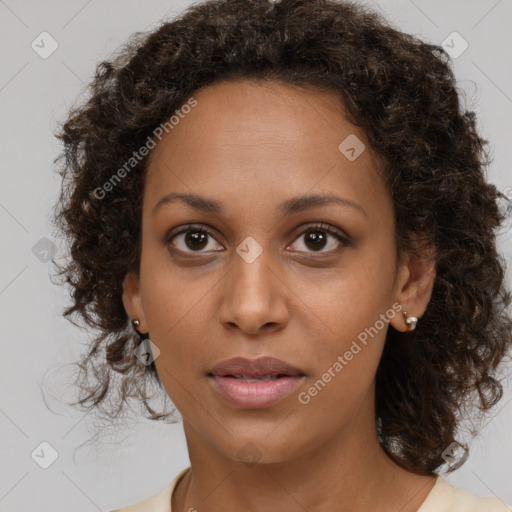 Neutral black young-adult female with medium  brown hair and brown eyes