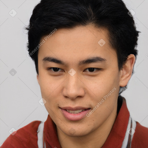 Joyful latino young-adult male with short  brown hair and brown eyes