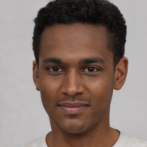 Neutral black young-adult male with short  black hair and brown eyes