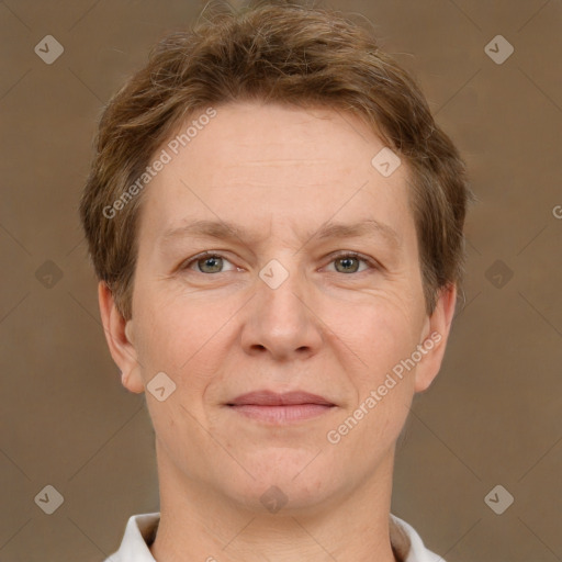 Joyful white adult female with short  brown hair and grey eyes