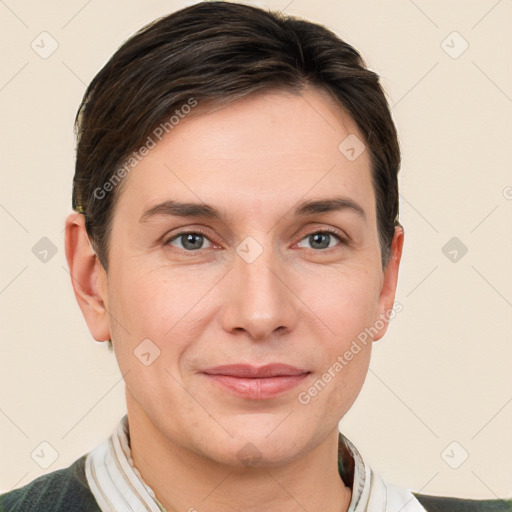 Joyful white young-adult female with short  brown hair and grey eyes