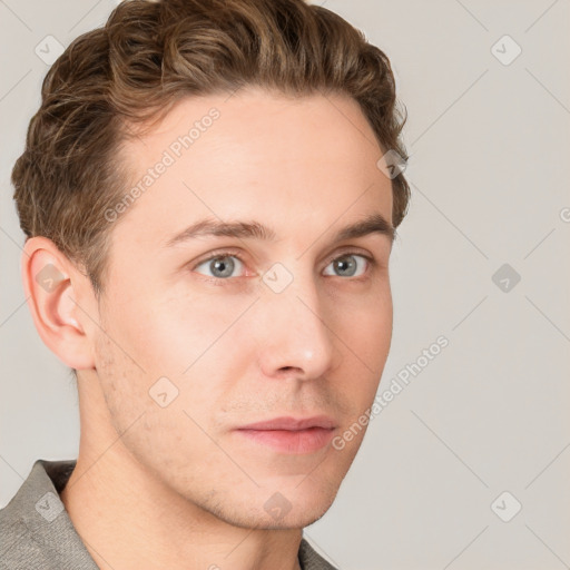 Neutral white young-adult male with short  brown hair and grey eyes