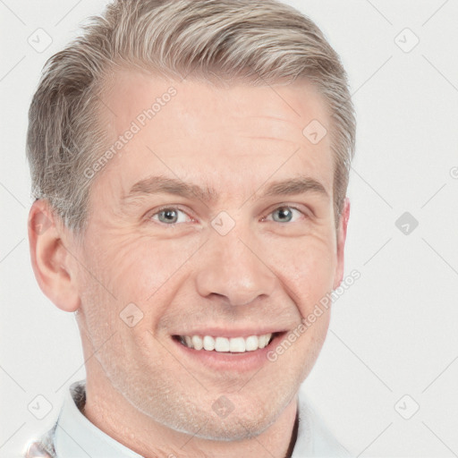 Joyful white adult male with short  brown hair and grey eyes