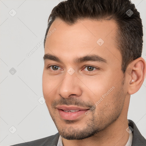 Joyful white young-adult male with short  brown hair and brown eyes