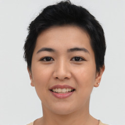 Joyful asian young-adult female with short  brown hair and brown eyes