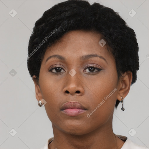 Neutral black young-adult female with short  brown hair and brown eyes