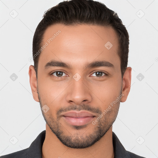 Joyful white young-adult male with short  brown hair and brown eyes