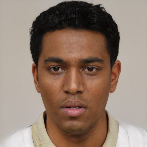 Neutral black young-adult male with short  black hair and brown eyes