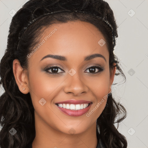 Joyful latino young-adult female with long  black hair and brown eyes