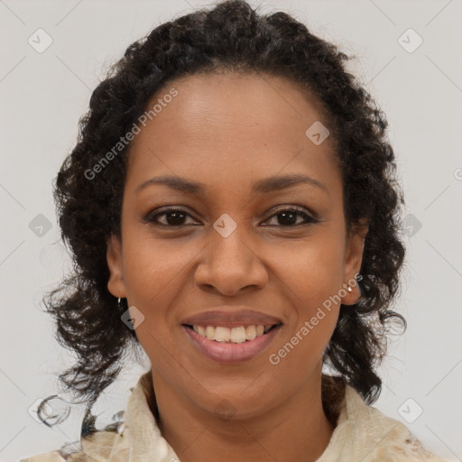 Joyful black young-adult female with medium  brown hair and brown eyes