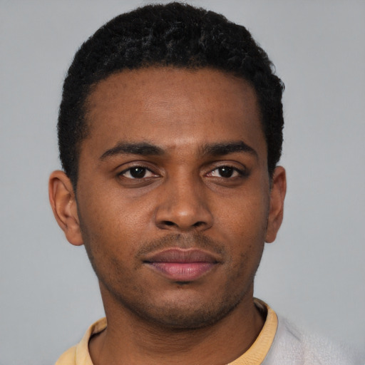 Neutral latino young-adult male with short  brown hair and brown eyes