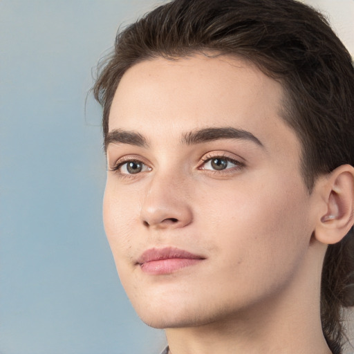 Joyful white young-adult male with medium  brown hair and brown eyes