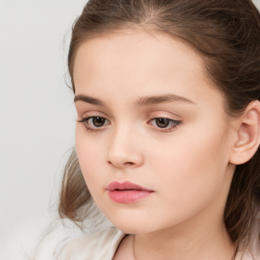 Neutral white child female with long  brown hair and brown eyes