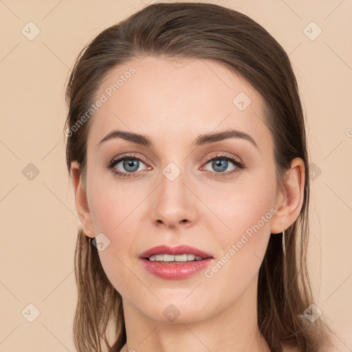 Joyful white young-adult female with long  brown hair and grey eyes