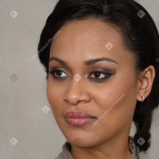 Joyful black young-adult female with medium  black hair and brown eyes