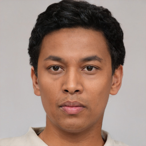Neutral asian young-adult male with short  black hair and brown eyes