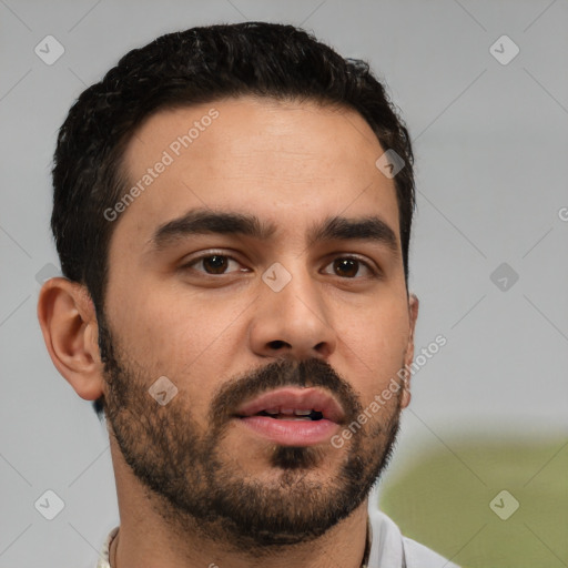 Neutral white young-adult male with short  black hair and brown eyes