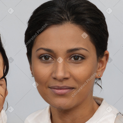 Joyful latino young-adult female with medium  brown hair and brown eyes