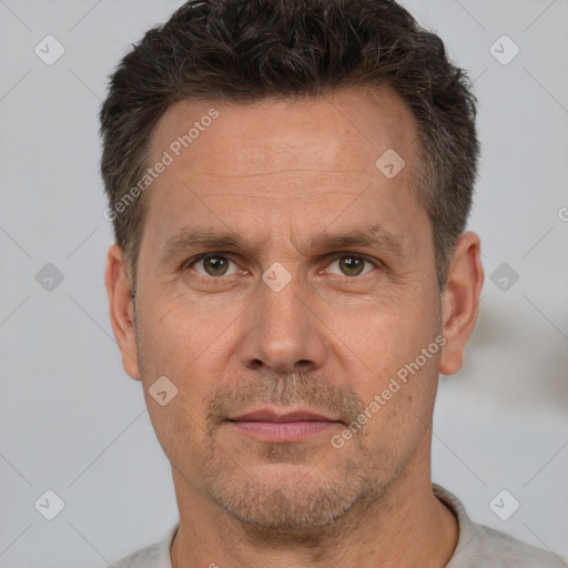 Neutral white adult male with short  brown hair and brown eyes