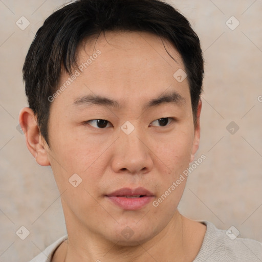 Neutral asian young-adult male with short  brown hair and brown eyes