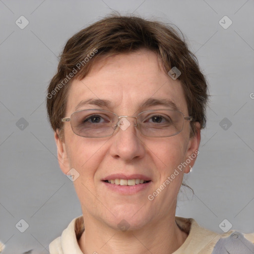 Joyful white adult female with short  brown hair and grey eyes