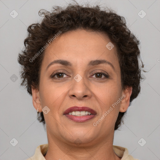 Joyful white adult female with short  brown hair and brown eyes