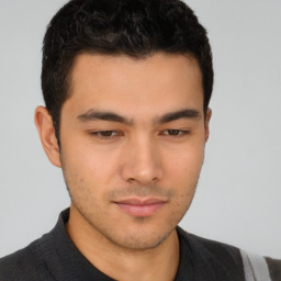 Neutral asian young-adult male with short  brown hair and brown eyes