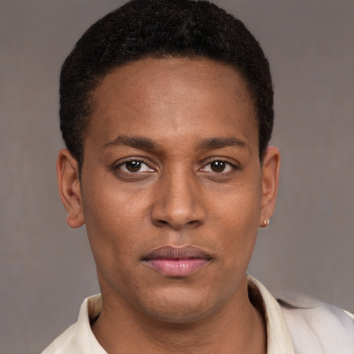 Neutral latino young-adult male with short  brown hair and brown eyes