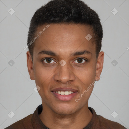 Joyful black young-adult male with short  brown hair and brown eyes