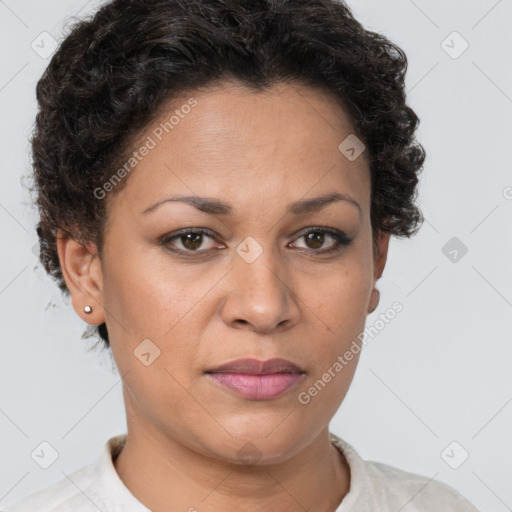 Joyful white adult female with short  brown hair and brown eyes