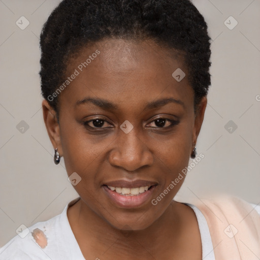 Joyful black young-adult female with short  brown hair and brown eyes