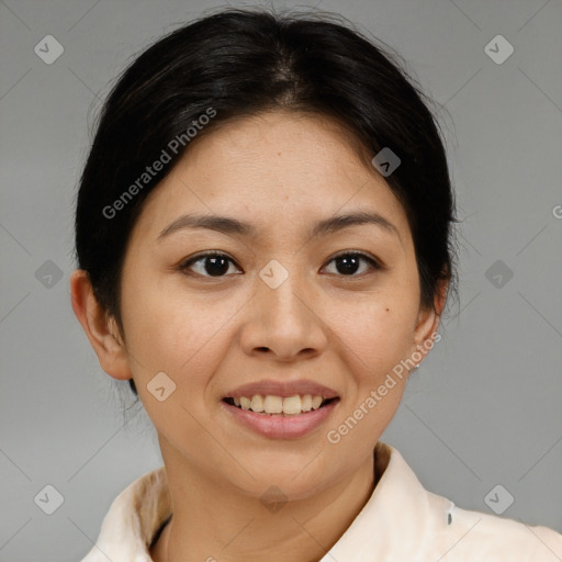 Joyful asian young-adult female with short  brown hair and brown eyes