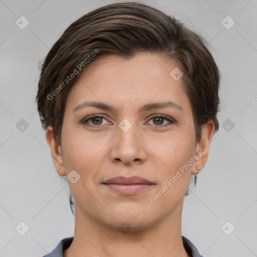 Joyful white young-adult female with short  brown hair and grey eyes