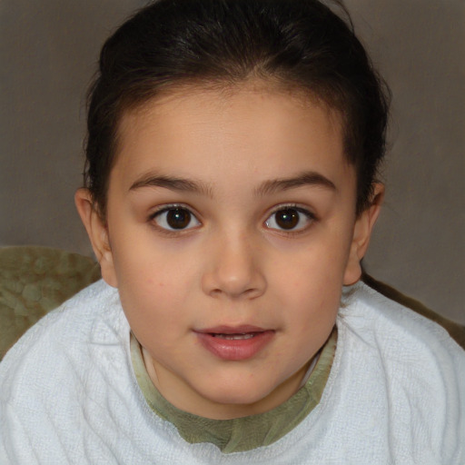 Joyful white child female with short  brown hair and brown eyes