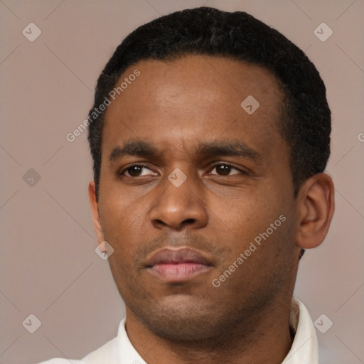 Neutral black young-adult male with short  black hair and brown eyes