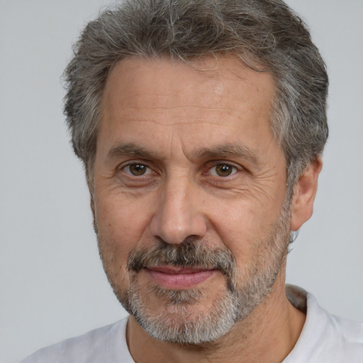 Neutral white middle-aged male with short  gray hair and brown eyes