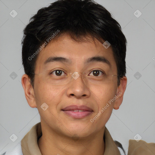 Joyful asian young-adult male with short  brown hair and brown eyes