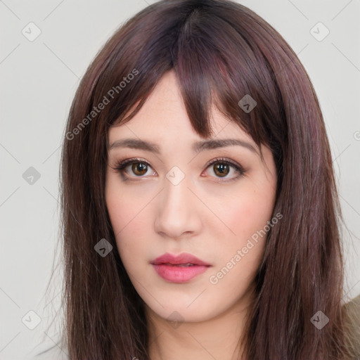 Neutral white young-adult female with long  brown hair and brown eyes