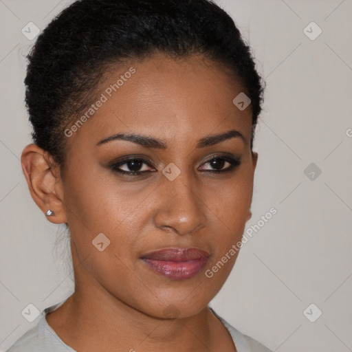 Joyful black young-adult female with short  brown hair and brown eyes