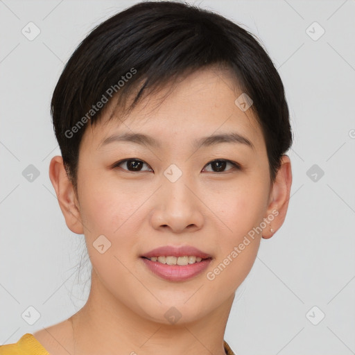 Joyful asian young-adult female with short  brown hair and brown eyes