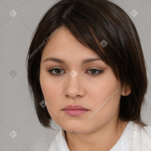 Neutral white young-adult female with medium  brown hair and brown eyes