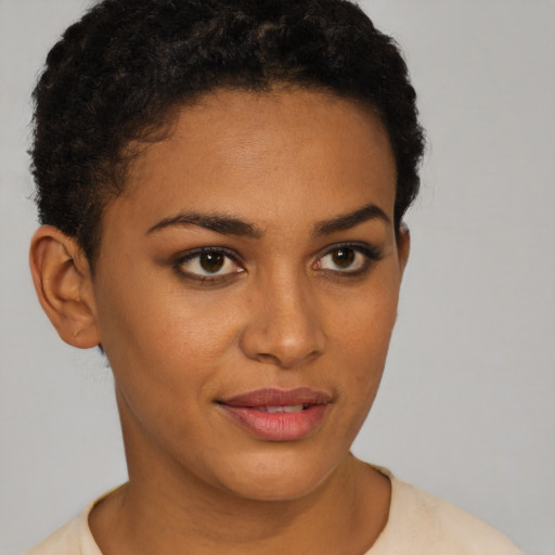 Joyful latino young-adult female with short  brown hair and brown eyes